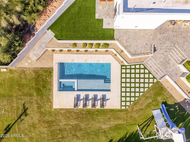 a bathroom with a granite countertop sink toilet a shower and a mirror
