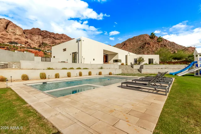 a work room with furniture and wooden floor