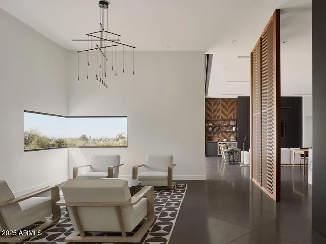 a outdoor living space with furniture and city view