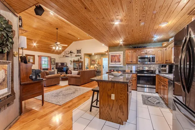 a bedroom with bed and a window