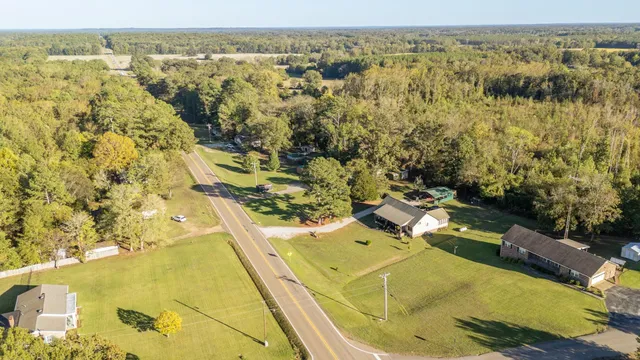 a view of a house with a swimming pool