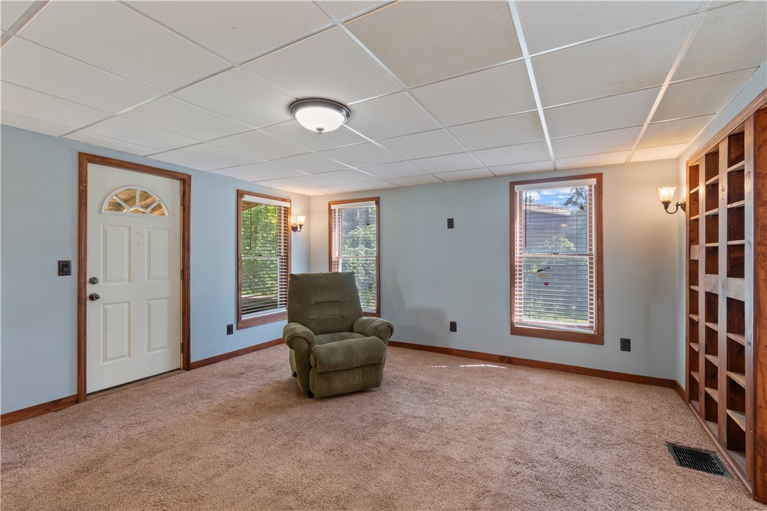 369 Bloom Road Arcadia, NY 14513 - Photo 10 of 38 The living room that opens to the covered front porch