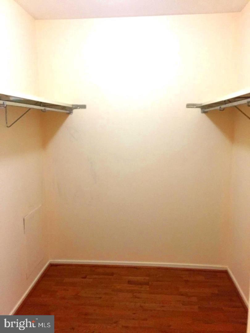 10000 Stedwick Road, Unit 204 Gaithersburg, MD 20886 - Photo 26 of 27 Master Bedroom Walk-in Closet