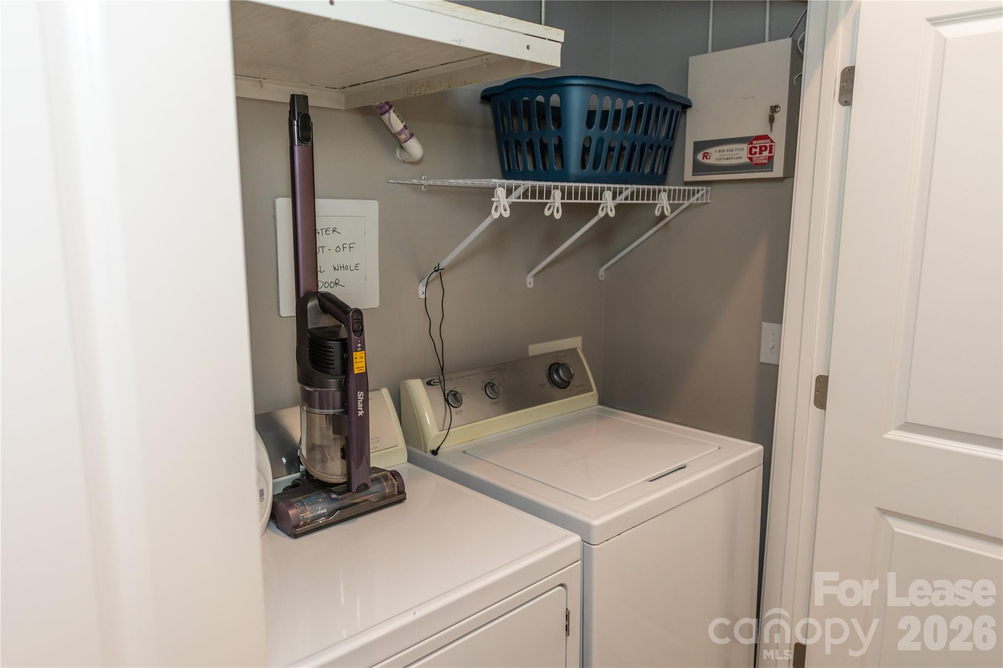 107 White Street, Unit B Morganton, NC 28655 - Photo 13 of 18 a view of storage and utility room with washer and dryer