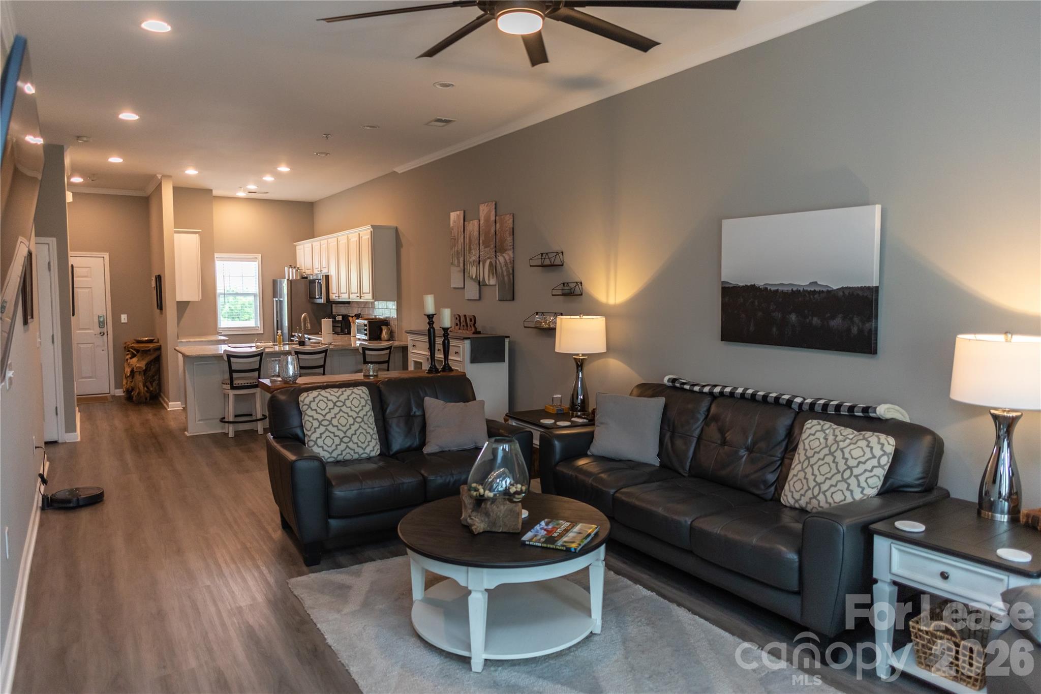 107 White Street, Unit B Morganton, NC 28655 - Photo 3 of 18 a living room with furniture and a wooden floor