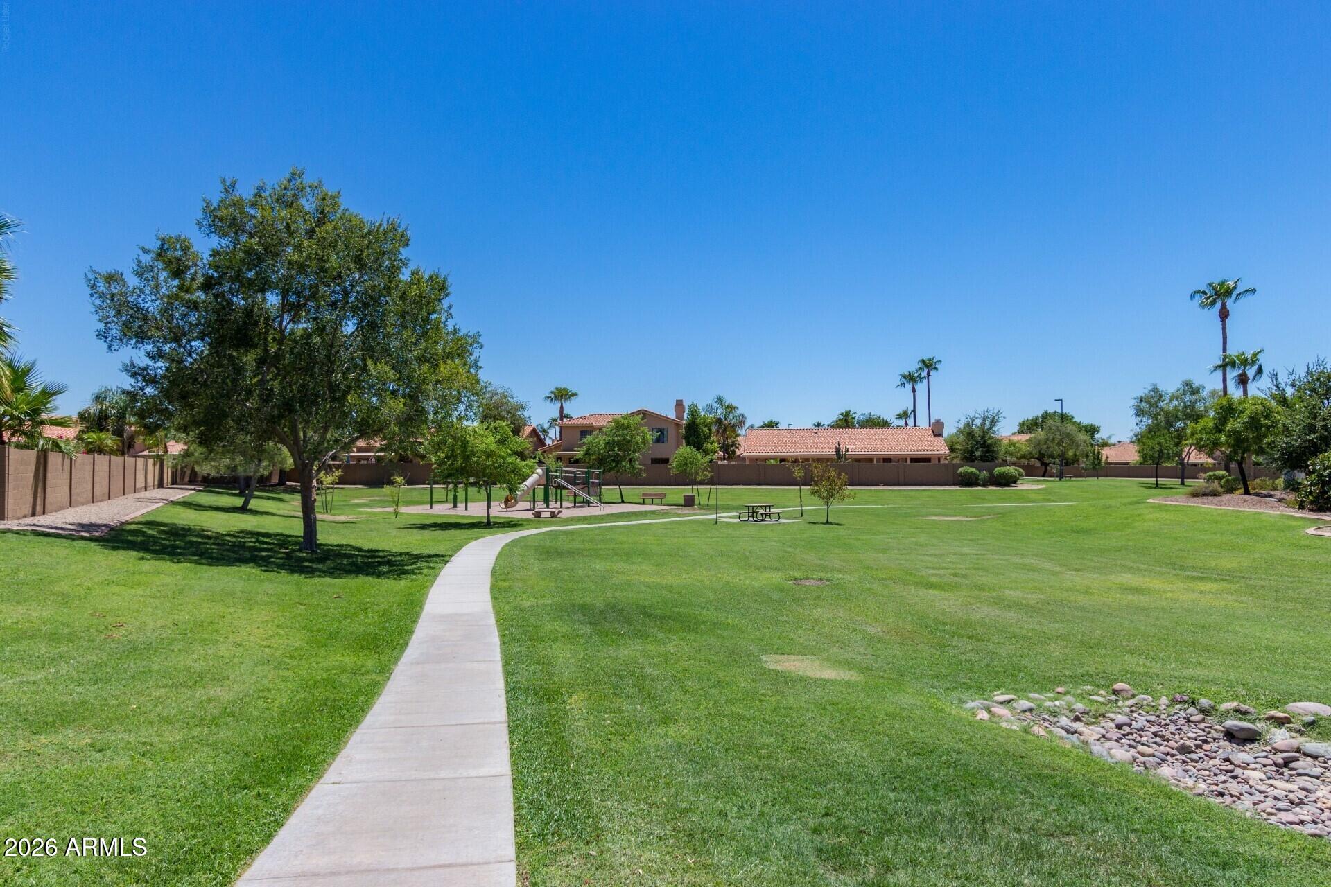 1434 West Key Harbor Drive Gilbert, AZ 85233 - Photo 117 of 144 a front view of a house with garden