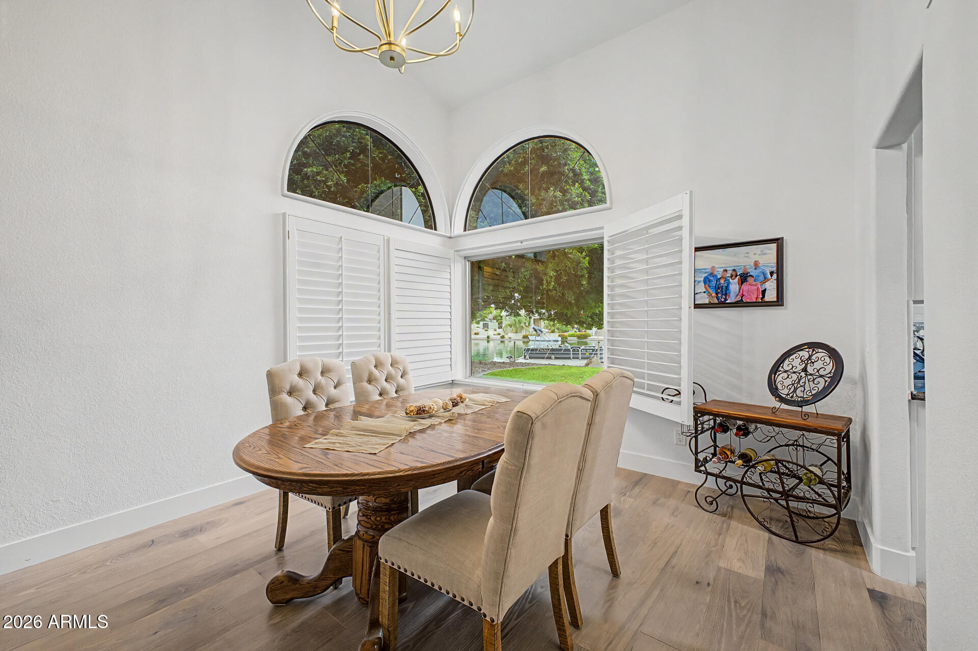 1434 West Key Harbor Drive Gilbert, AZ 85233 - Photo 121 of 144 a view of a dining room with furniture and chandelier