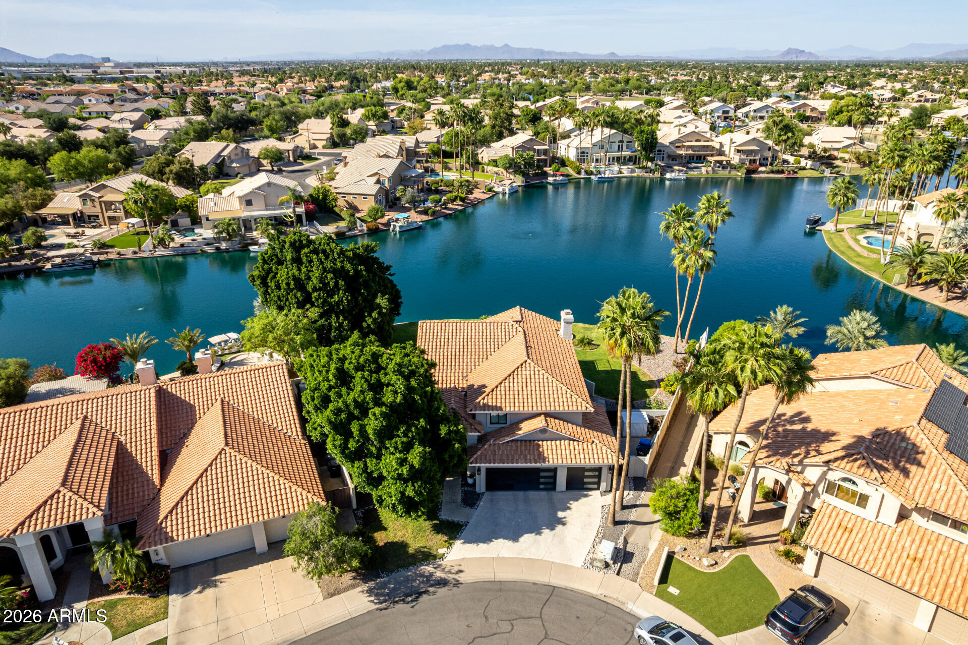 1434 West Key Harbor Drive Gilbert, AZ 85233 - Photo 14 of 144 an aerial view of a house with a lake view