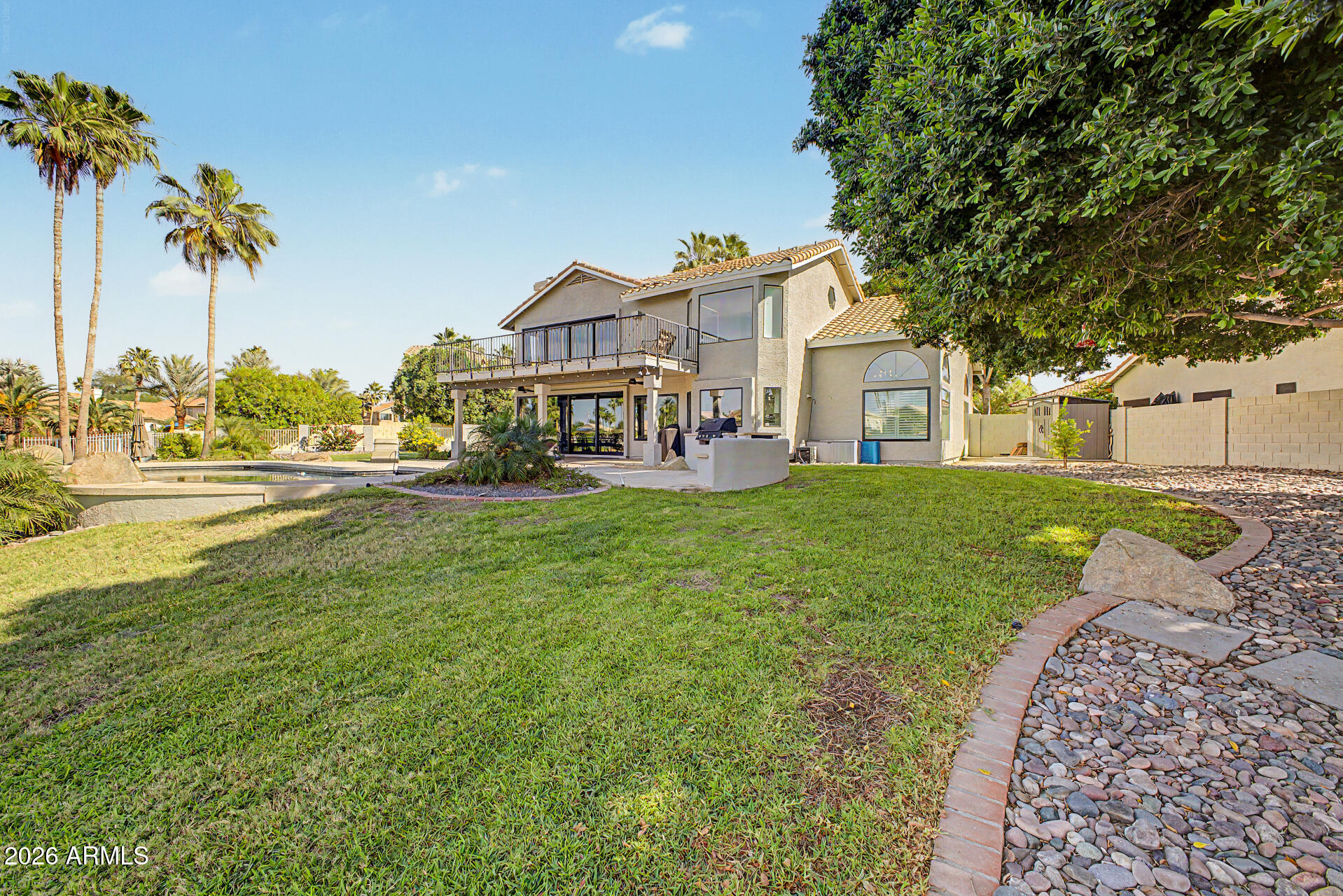 1434 West Key Harbor Drive Gilbert, AZ 85233 - Photo 28 of 144 a house view with garden space and trees