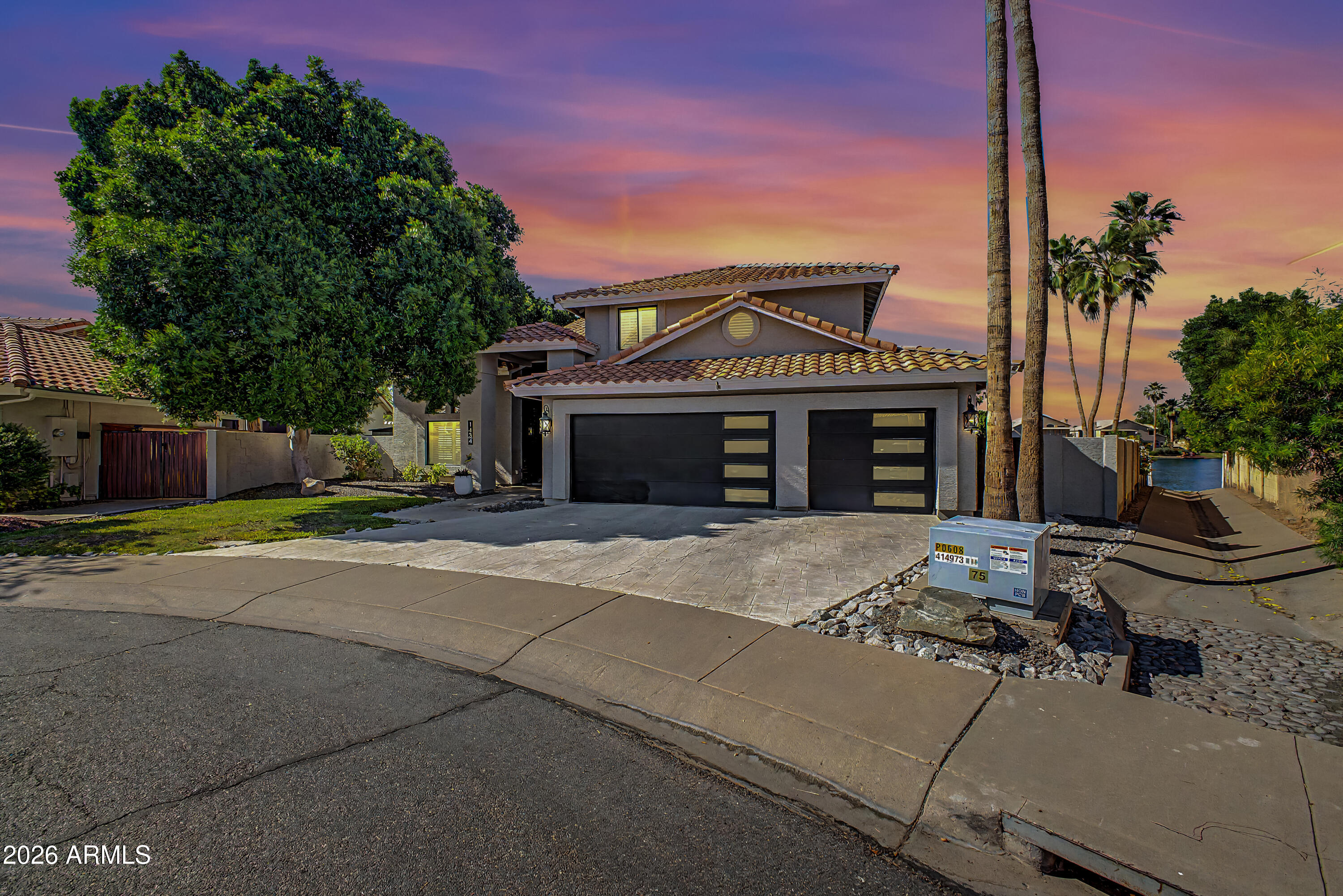 1434 West Key Harbor Drive Gilbert, AZ 85233 - Photo 38 of 144 a front view of a house with a yard