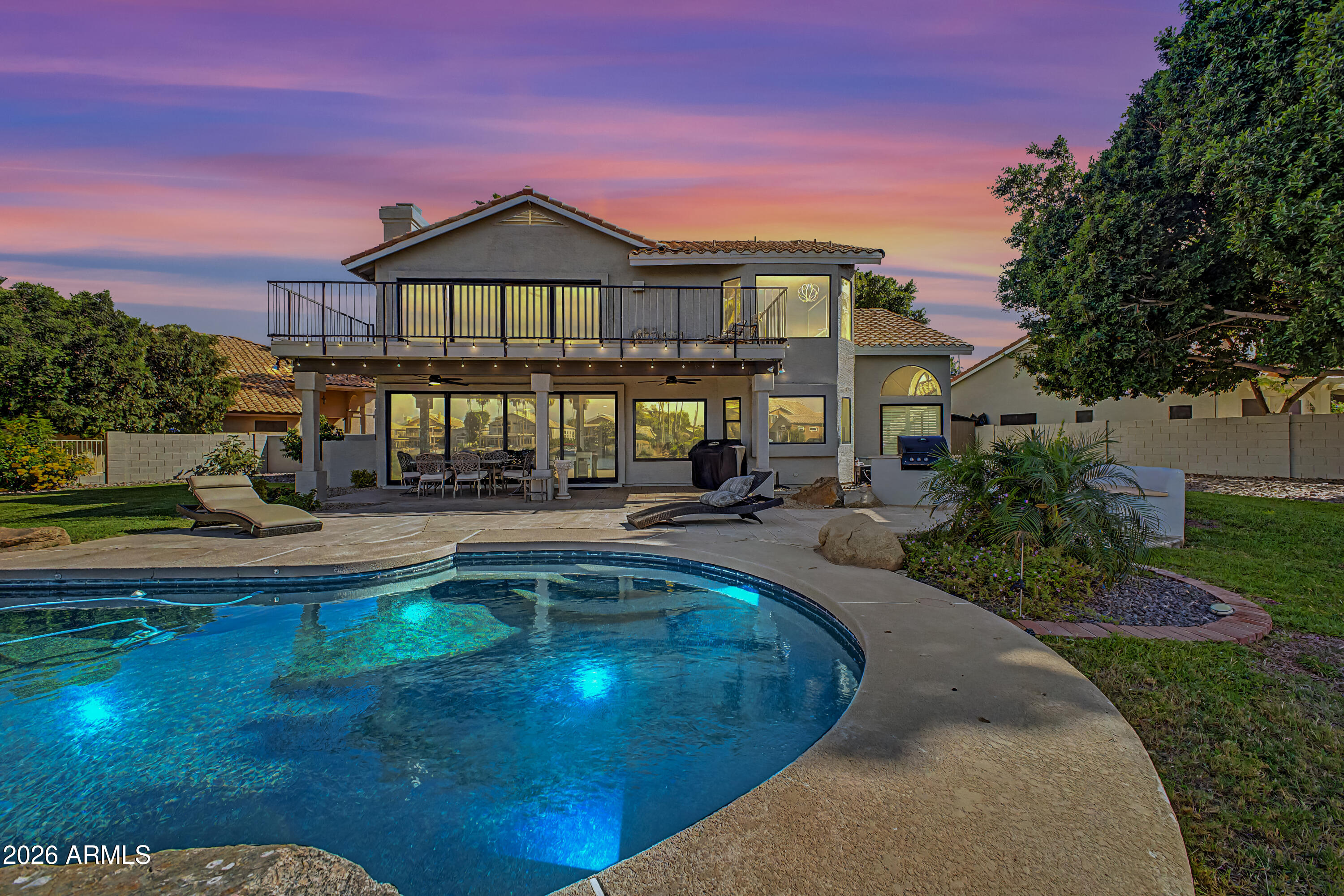 1434 West Key Harbor Drive Gilbert, AZ 85233 - Photo 39 of 144 a view of a house with swimming pool and sitting area
