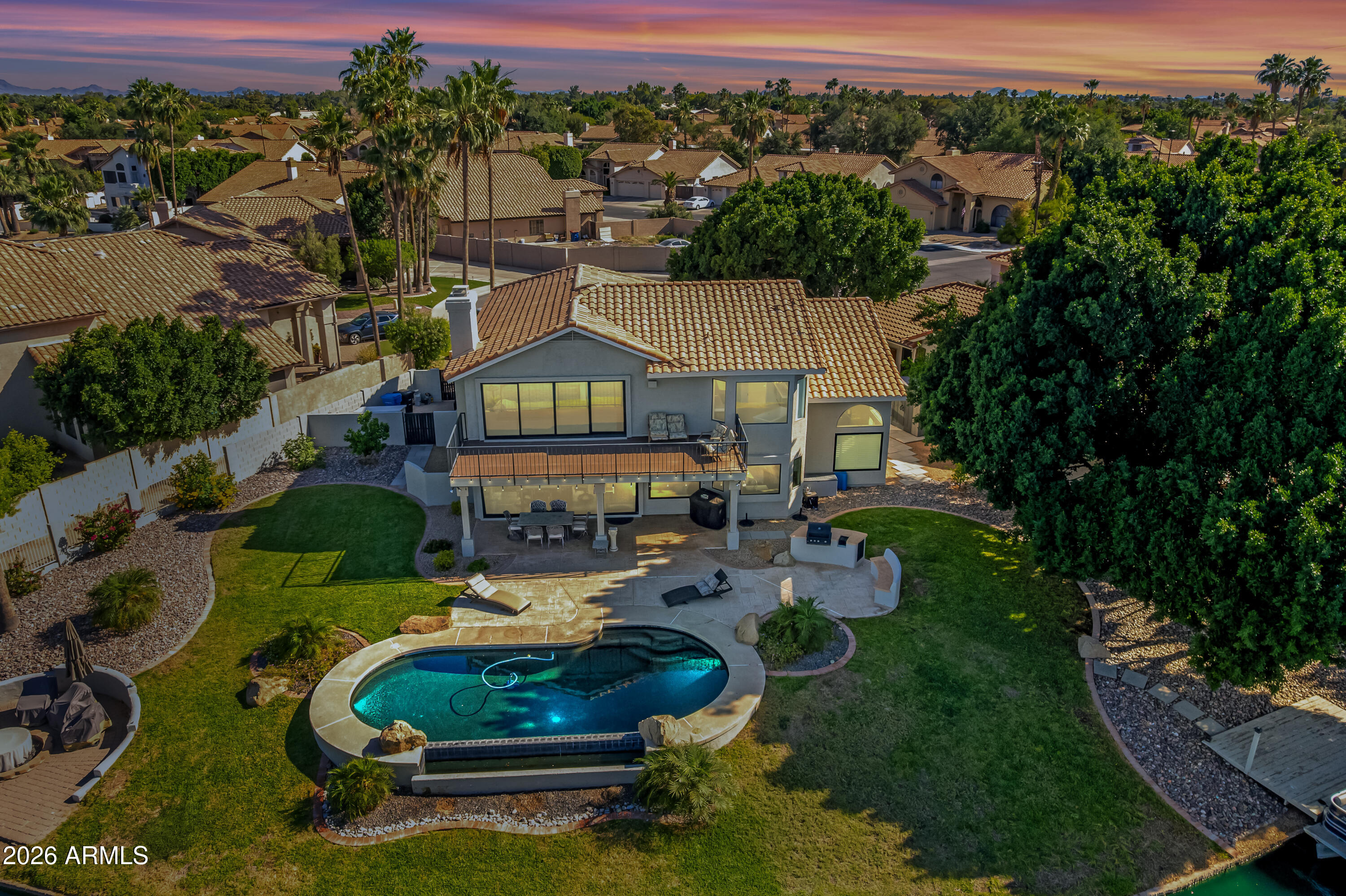 1434 West Key Harbor Drive Gilbert, AZ 85233 - Photo 42 of 144 an aerial view of a house with garden space lake view and mountain view in back