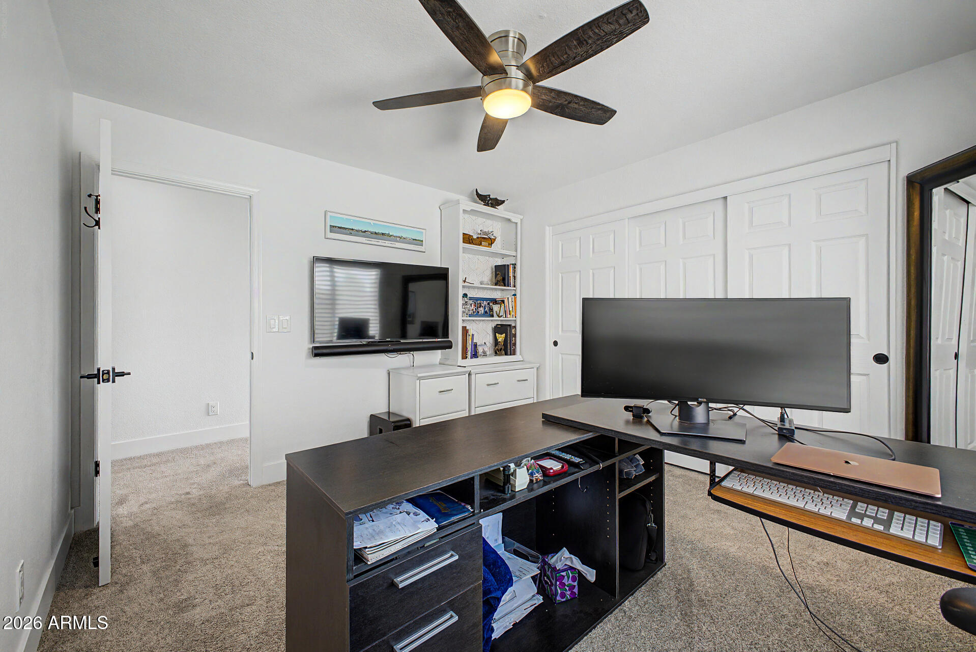 1434 West Key Harbor Drive Gilbert, AZ 85233 - Photo 85 of 144 a living room with furniture and a flat screen tv
