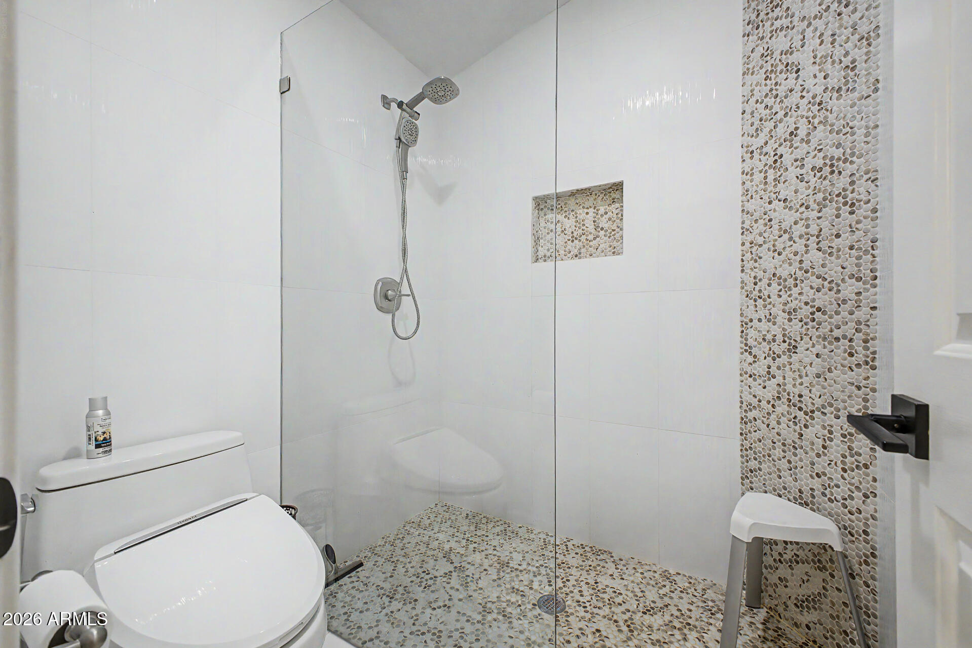 1434 West Key Harbor Drive Gilbert, AZ 85233 - Photo 91 of 144 a white toilet sitting next to a bathroom sink