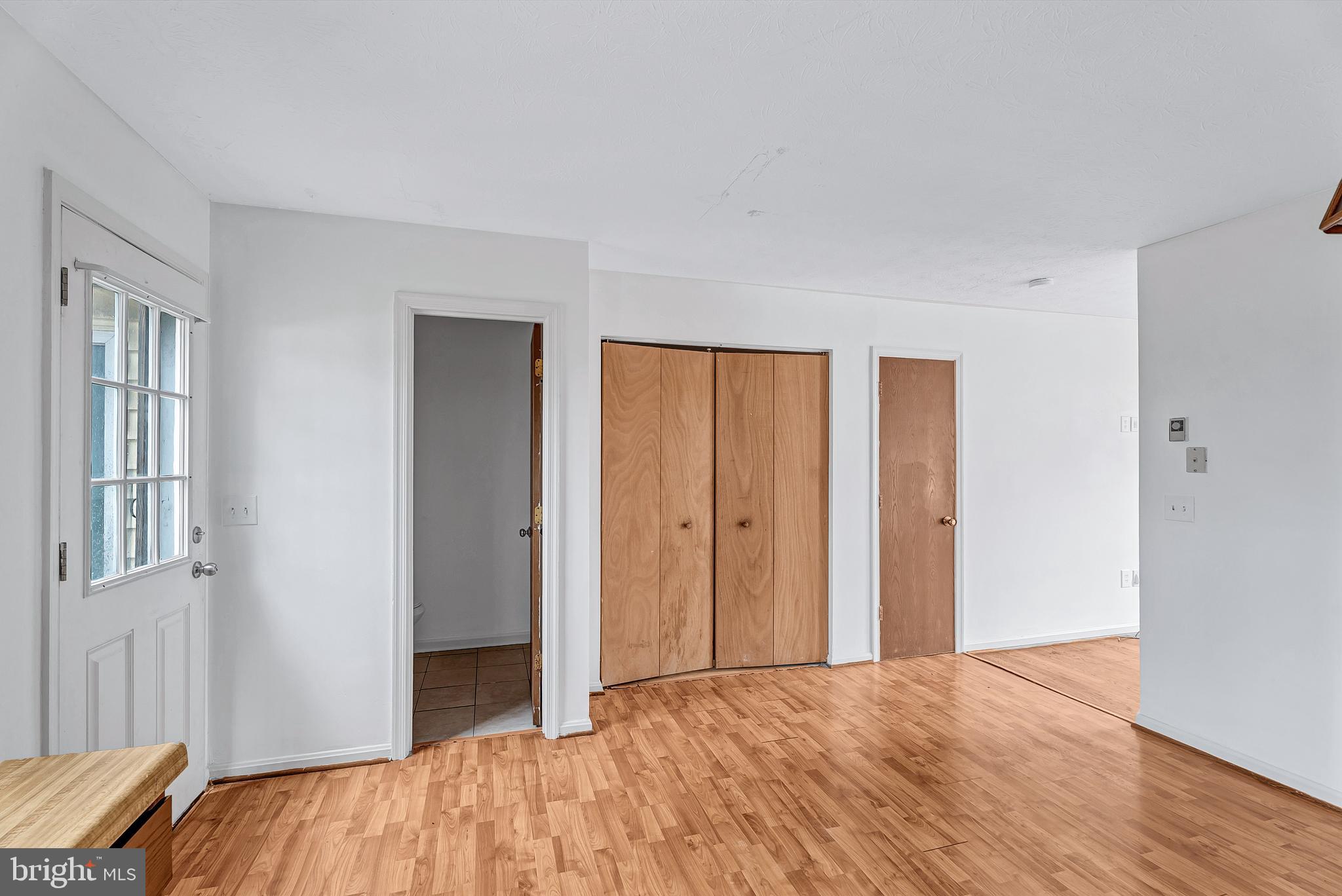 210 Brunswick Road Stephens City, VA 22655 - Photo 7 of 18 a view of empty room with wooden floor