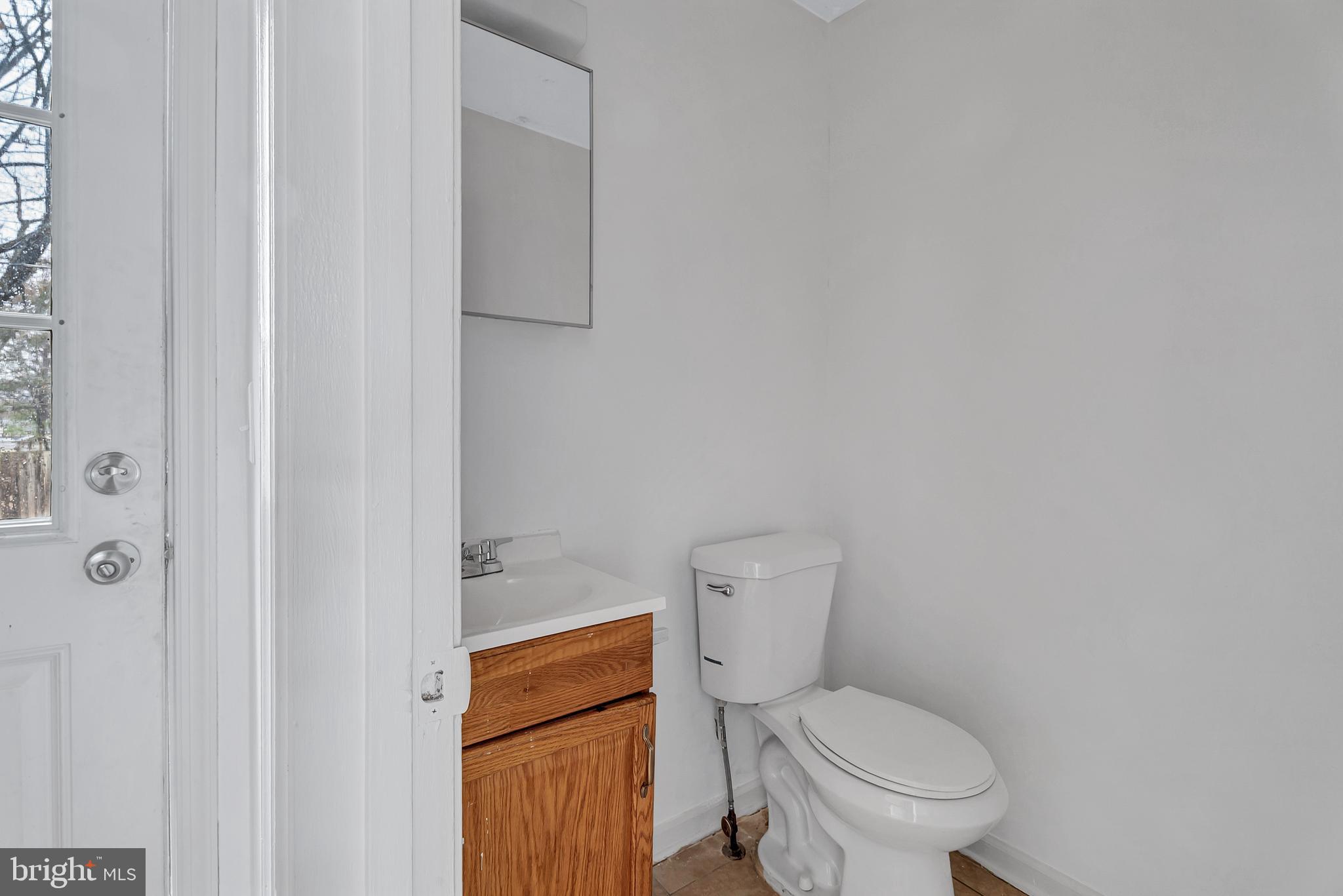 210 Brunswick Road Stephens City, VA 22655 - Photo 9 of 18 a white toilet sitting next to a shower