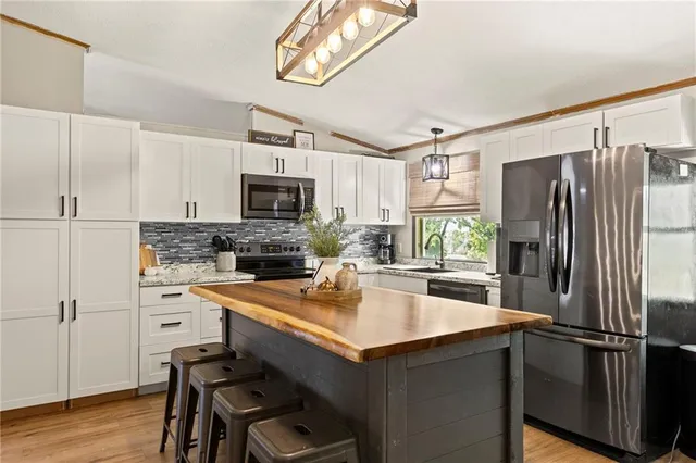 $430,000 | 14115 South Sam Moore Road, Lone Jack, MO 64070