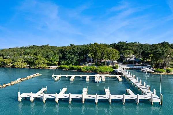 a view of a lake with houses with outdoor space