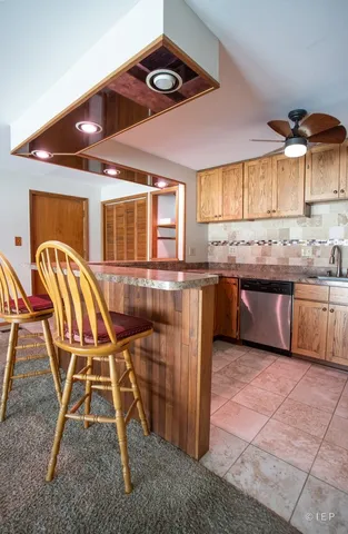 a view of storage and utility room with washer and dryer