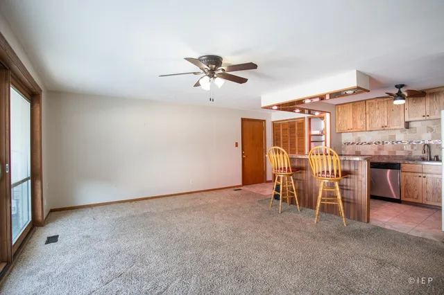 a view of a livingroom with furniture
