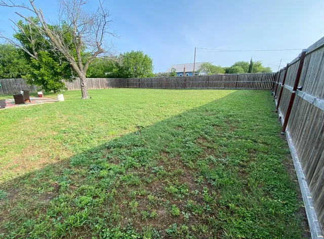 a view of an outdoor space and a yard