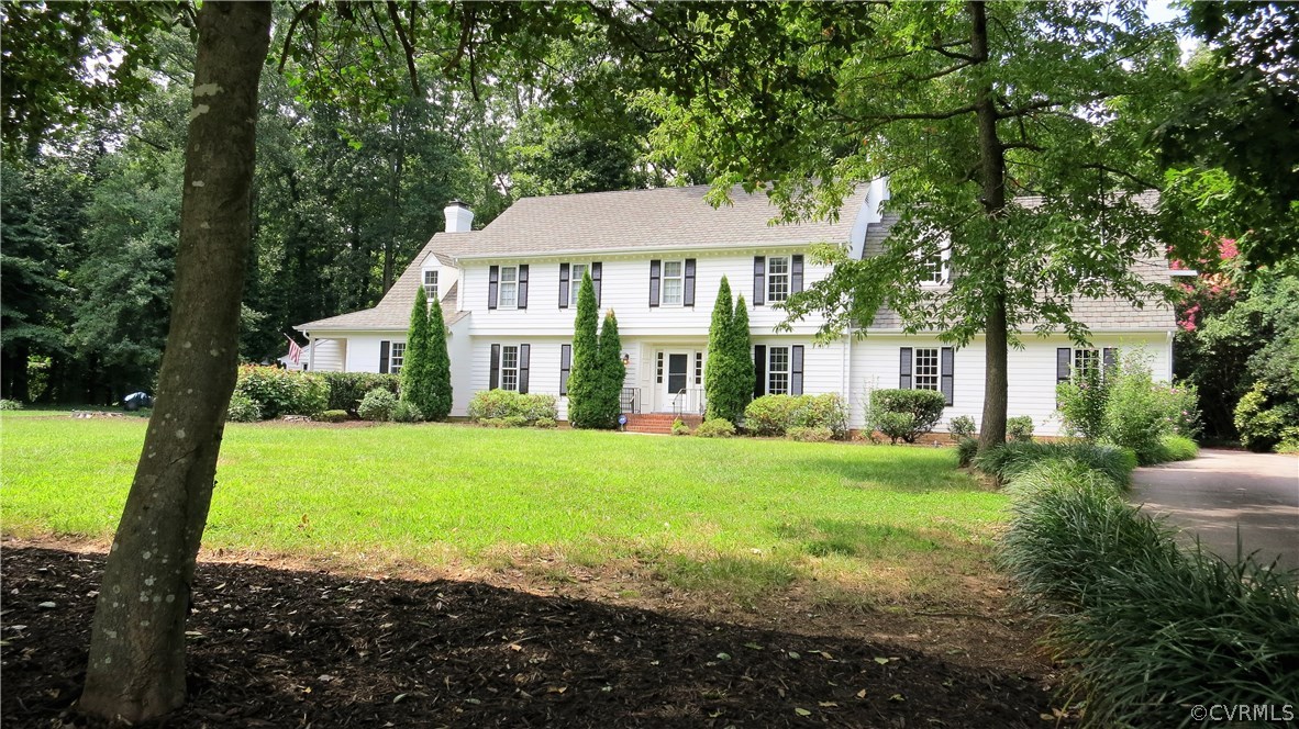 2420 Wadebridge Road Midlothian, VA 23113 - Photo 8 of 50 a front view of a house with garden