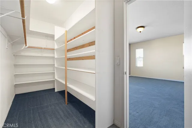 a view of a room with rack on the wall