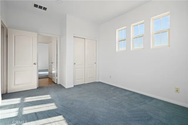 a utility room with sink dryer and washer