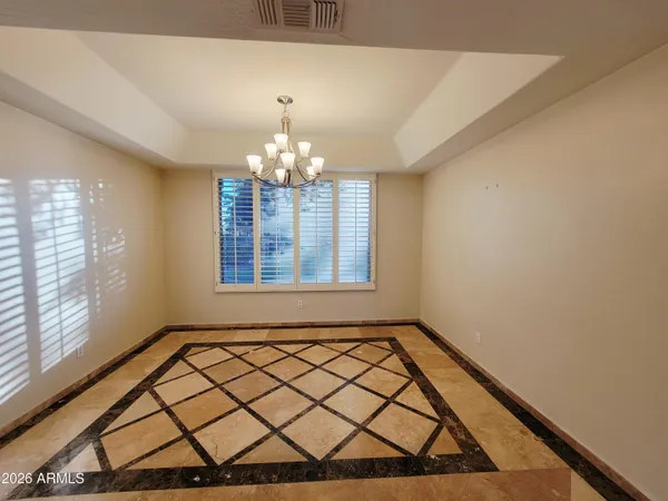 a view of a room with windows