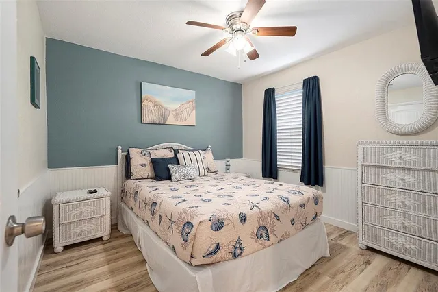 a bathroom with a toilet sink and shower