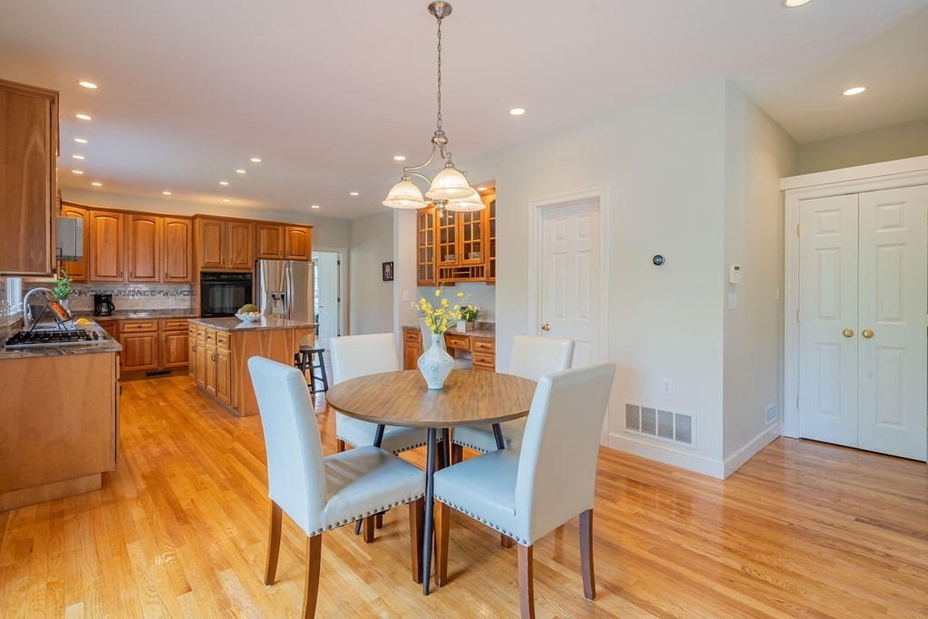 9 Bates Road Lexington, MA 02421 - Photo 18 of 42 a view of a dining room with furniture