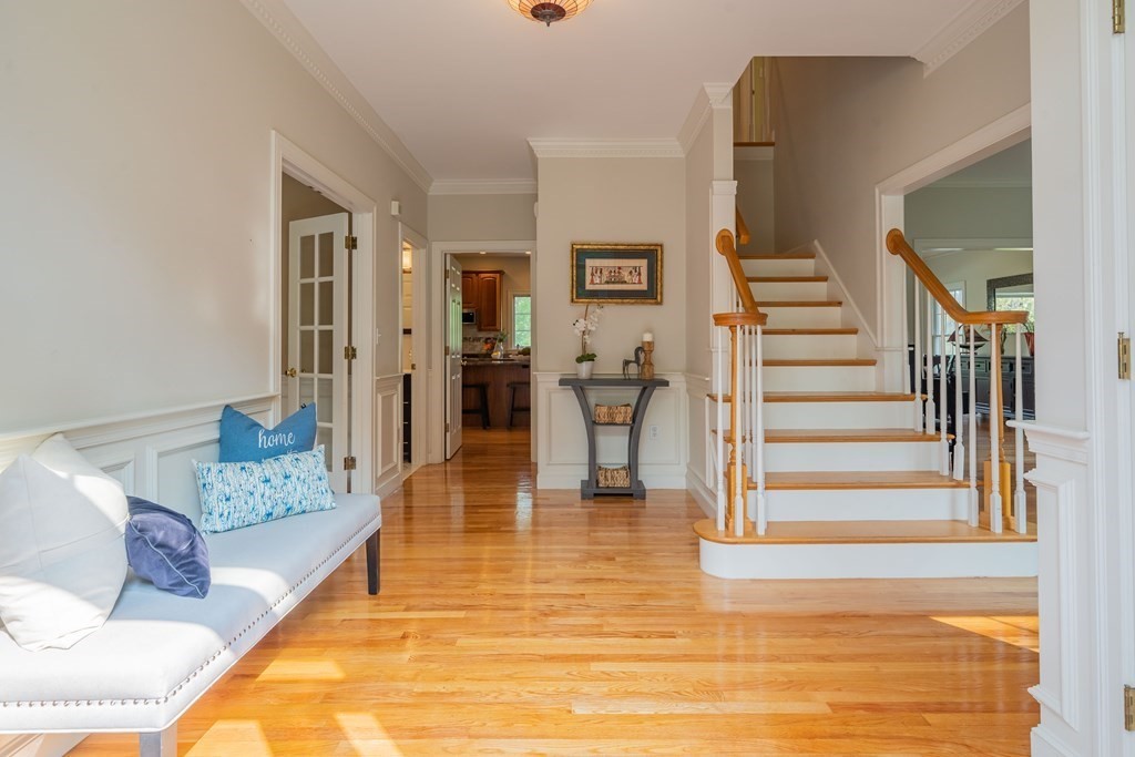 9 Bates Road Lexington, MA 02421 - Photo 2 of 42 a living room with furniture and wooden floor