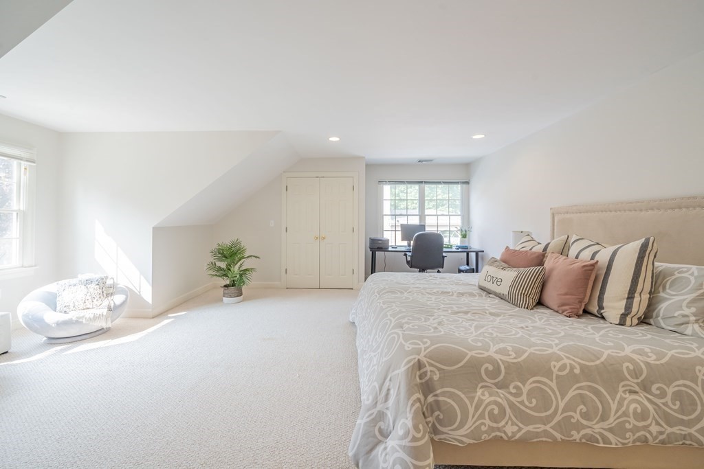 9 Bates Road Lexington, MA 02421 - Photo 33 of 42 a bedroom with a large bed and a window