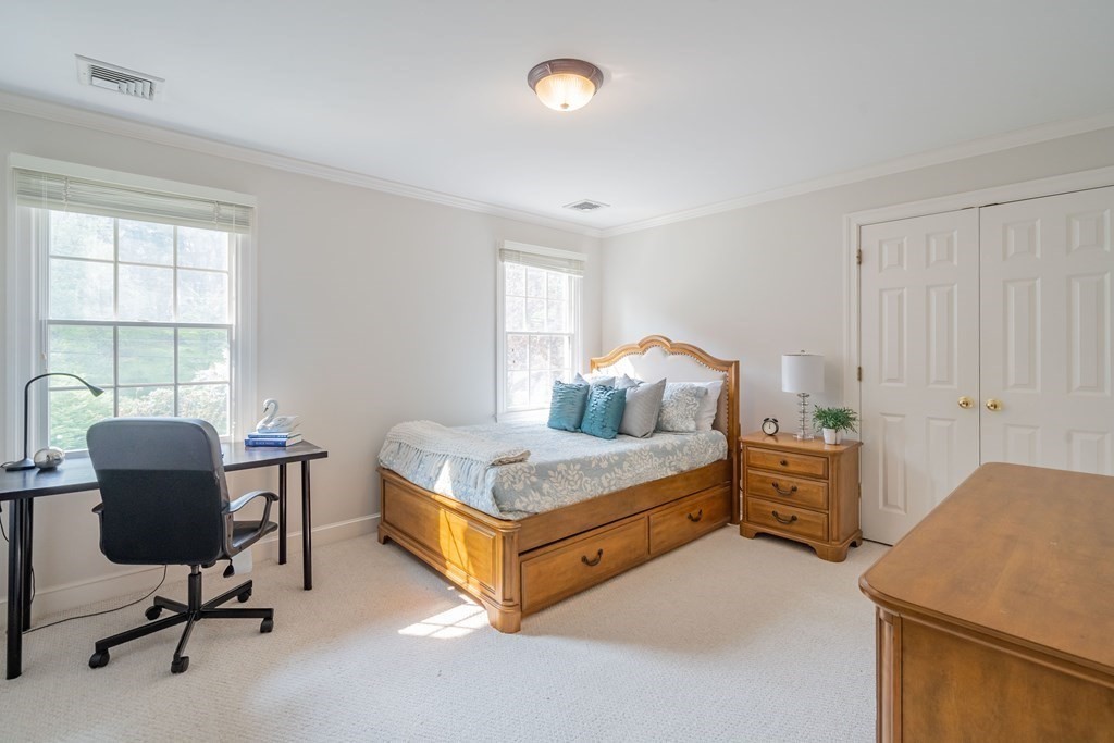 9 Bates Road Lexington, MA 02421 - Photo 35 of 42 a bedroom with a workspace