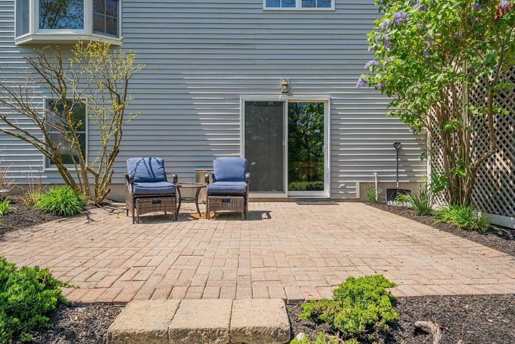 9 Bates Road Lexington, MA 02421 - Photo 41 of 42 a building outdoor space with a patio