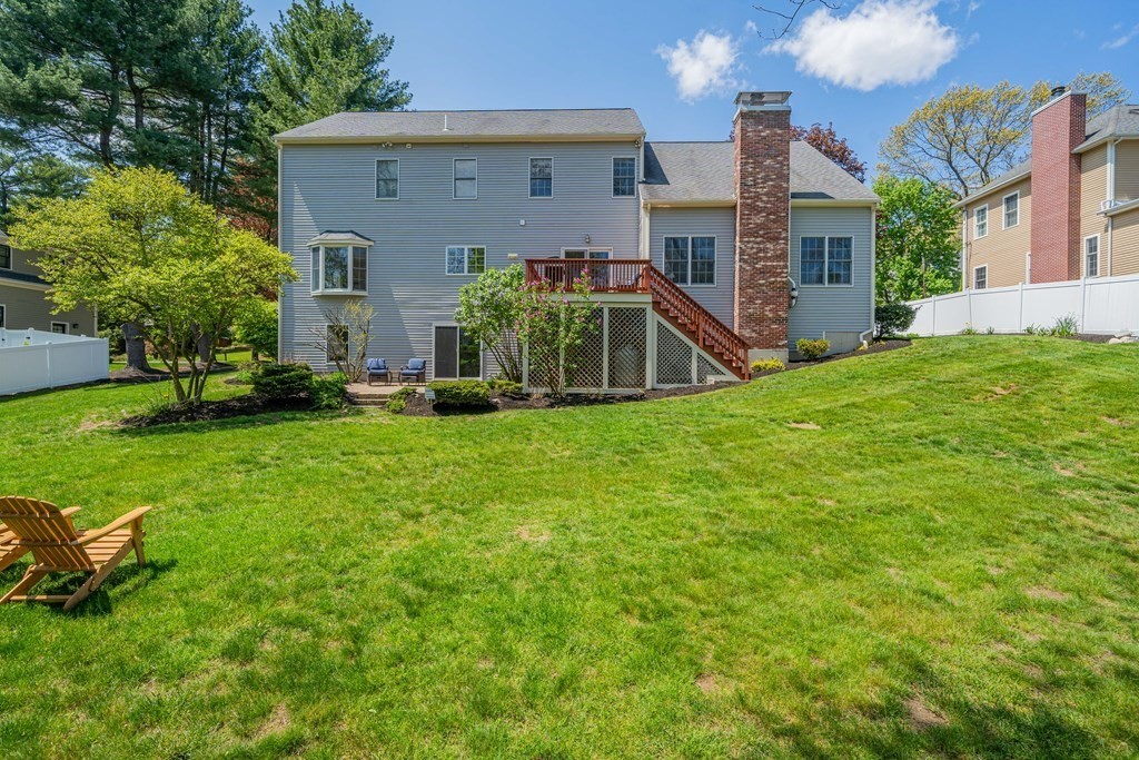 9 Bates Road Lexington, MA 02421 - Photo 42 of 42 a view of a house with a yard and sitting area