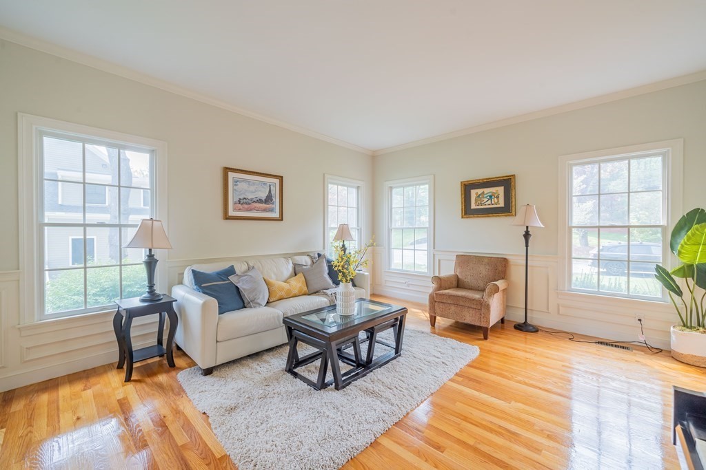 9 Bates Road Lexington, MA 02421 - Photo 6 of 42 a living room with furniture and a window