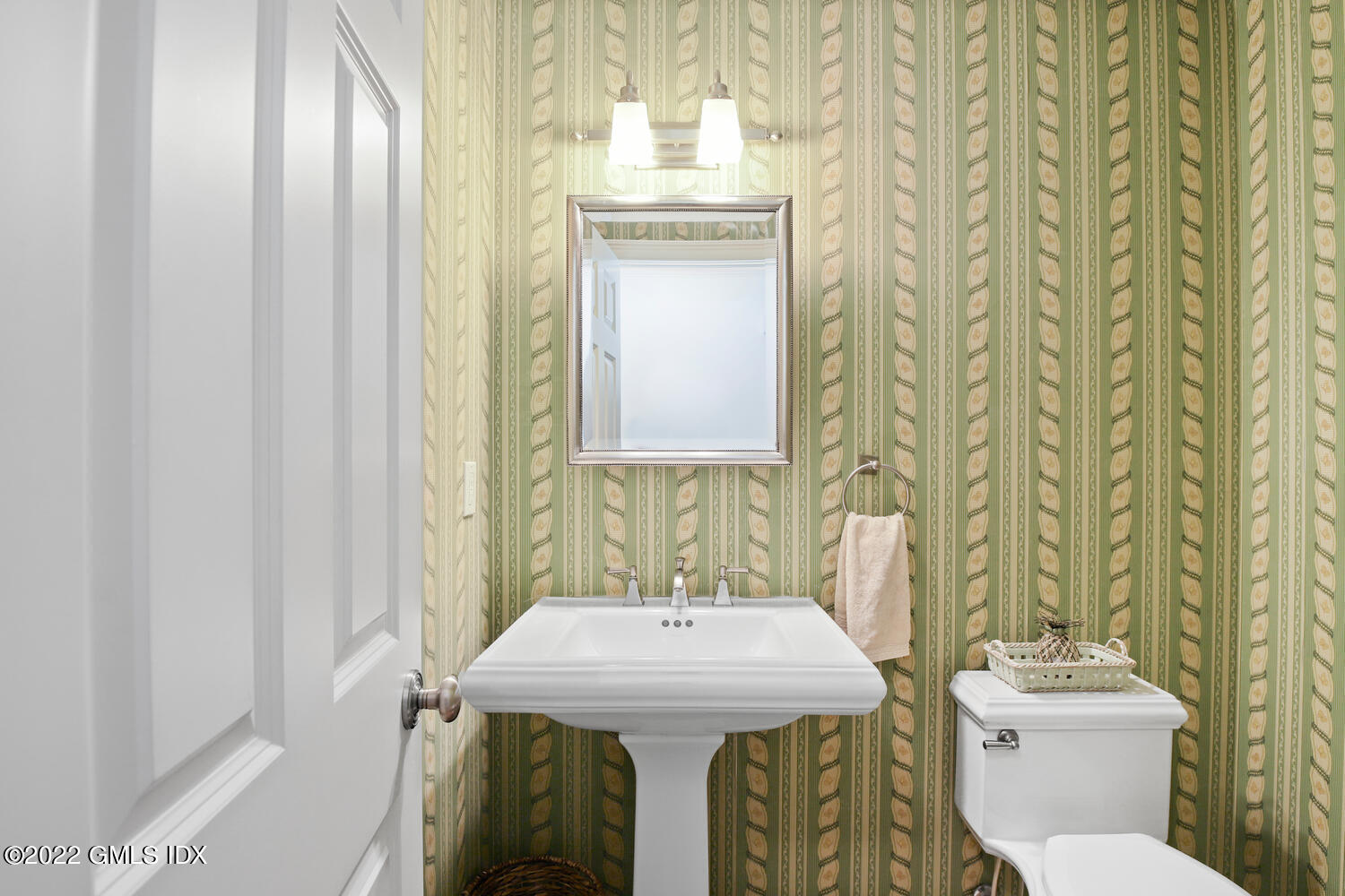 4 Rainbow Drive Riverside, CT 06878 - Photo 18 of 59 a bathroom with a sink and mirror with toilet