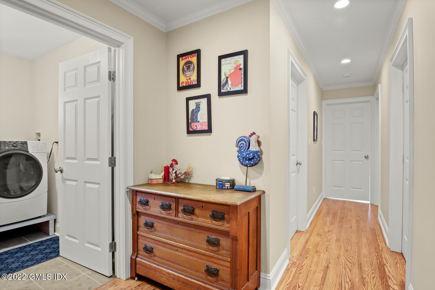 4 Rainbow Drive Riverside, CT 06878 - Photo 20 of 59 a view of a hallway with a washer and dryer