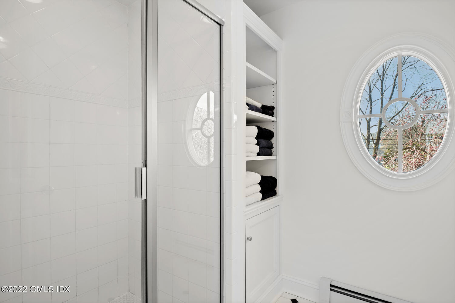 4 Rainbow Drive Riverside, CT 06878 - Photo 29 of 59 an entryway with wooden floor and a chandelier