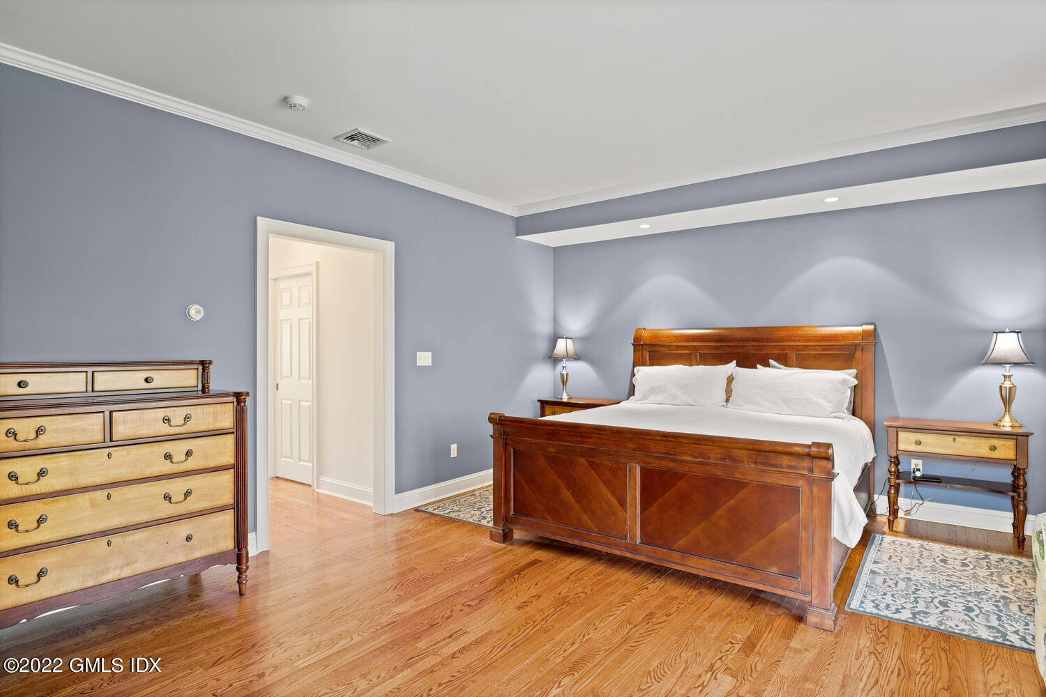 4 Rainbow Drive Riverside, CT 06878 - Photo 32 of 59 a bedroom with a bed and a dresser