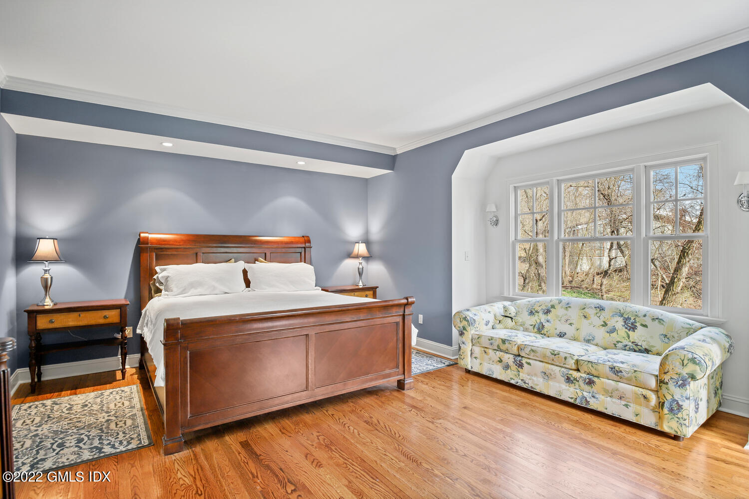 4 Rainbow Drive Riverside, CT 06878 - Photo 33 of 59 a bedroom with a bed and wooden floor