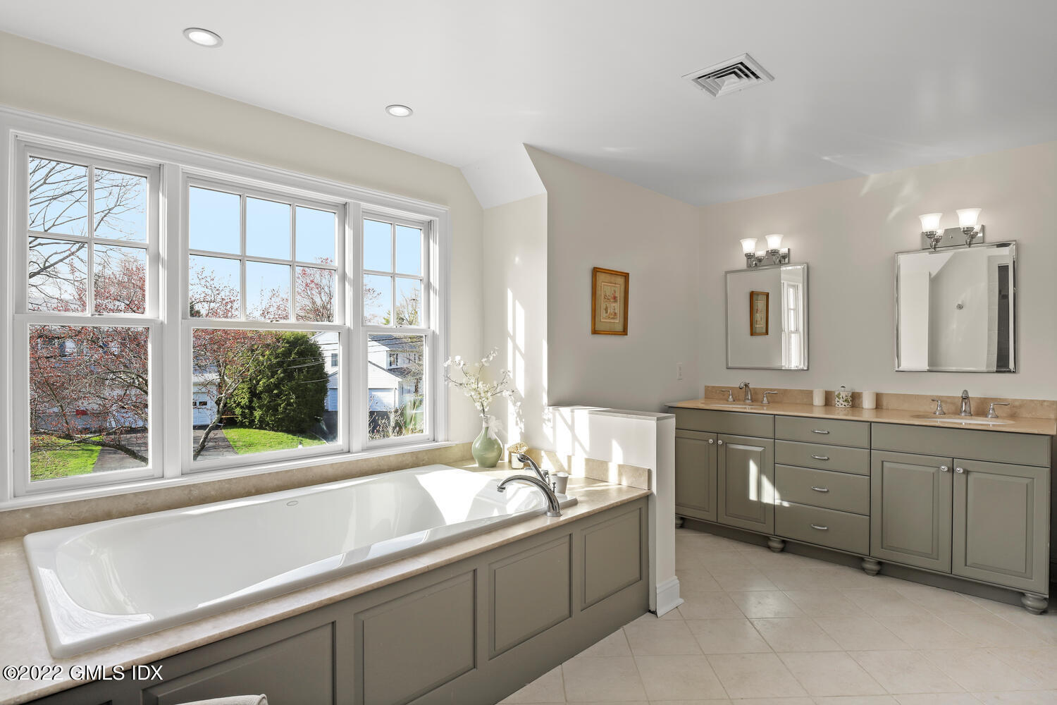 4 Rainbow Drive Riverside, CT 06878 - Photo 38 of 59 a bathroom with a granite countertop sink and a large mirror