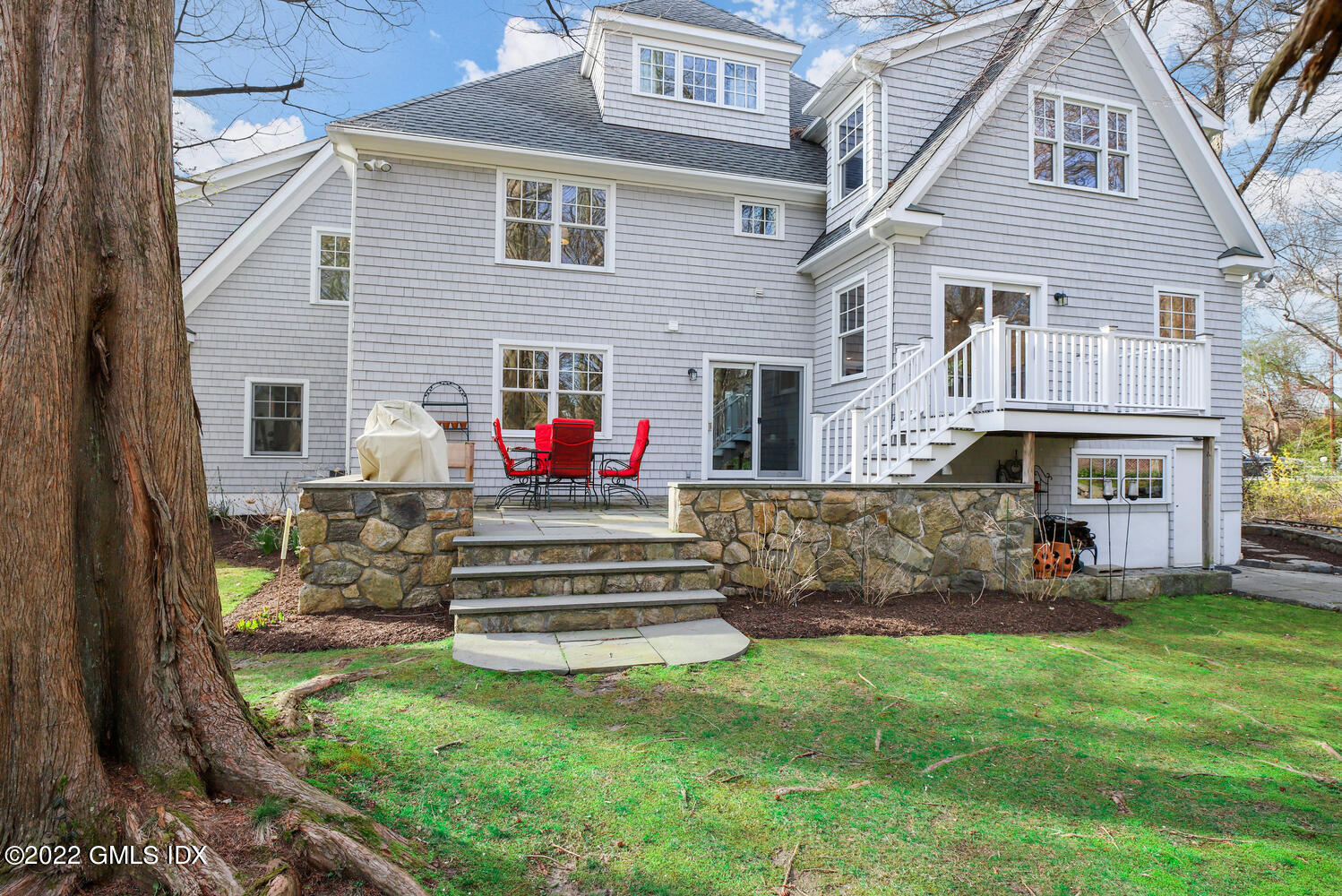 4 Rainbow Drive Riverside, CT 06878 - Photo 43 of 59 a front view of house with yard and outdoor seating