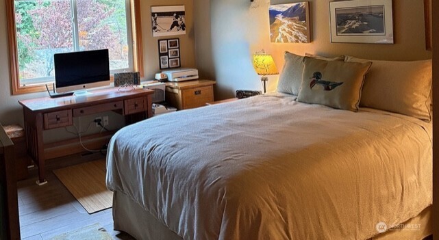 4062 Knowles Road Wenatchee, WA 98801 - Photo 11 of 20 a bedroom with a bed and a flat screen tv