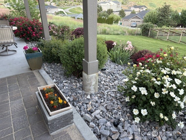 4062 Knowles Road Wenatchee, WA 98801 - Photo 18 of 20 a view of a garden with flowers and flowers