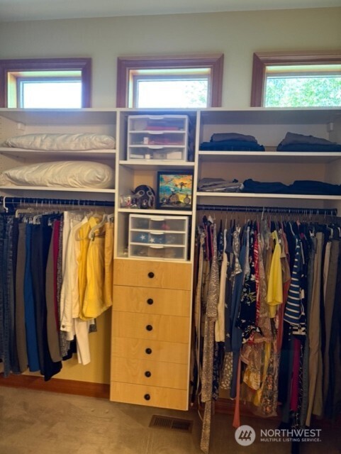 4062 Knowles Road Wenatchee, WA 98801 - Photo 8 of 20 a view of walk in closet with clothes and shoes