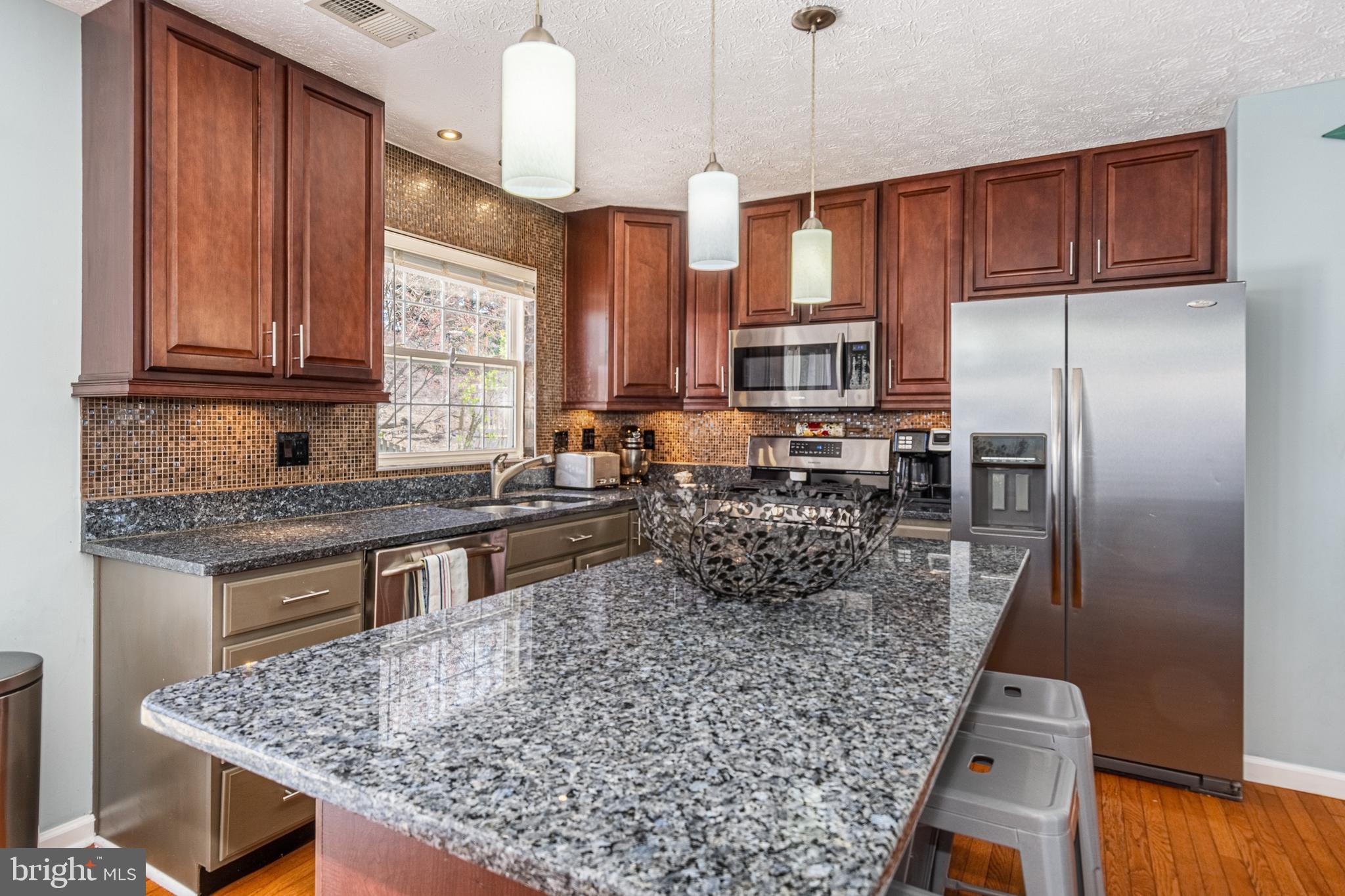 1433 Bretton View Road Annapolis, MD 21409 - Photo 9 of 40 Granite Counters + Island