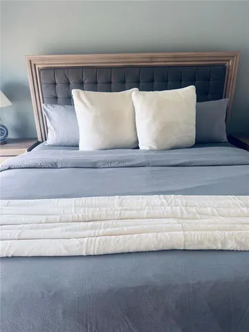 a view of a couch in a shelf