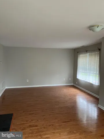a living room with a fireplace